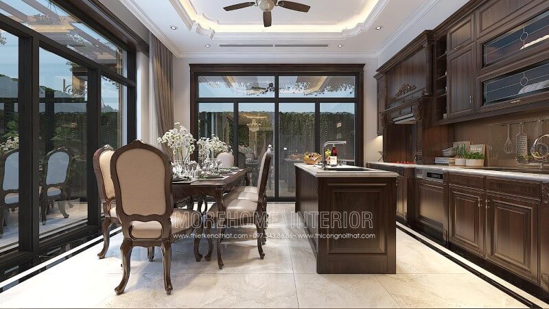 Mẫu tủ bếp tân cổ điển có đảo bếp được bố trí tại trung tâm phòng bếp tạo nên 1 khu nấu nướng riêng biệt, giúp việc công việc nấu nướng của chị em nội trợ trở nên thuận tiện hơn. Tủ bếp gỗ, tủ bếp gỗ tự nhiên, tủ bếp tân cổ điển