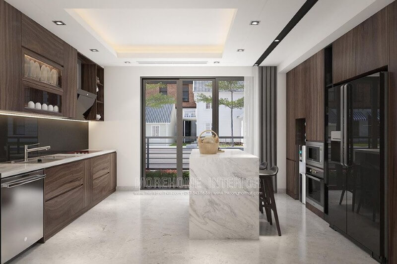 Trang trí phòng bếp đảo ấn tượng với nội thất gỗ công nghiệp cao cấp kết hợp bàn đảo đá ốp sang trọng. Thiết kế nội thất biệt thự