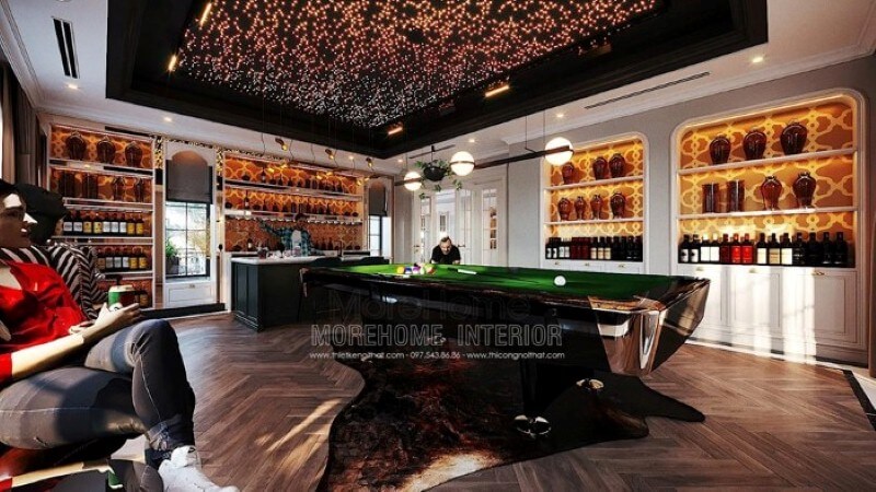 Bàn bi-a, quầy bar, hầm rượu, trần xuyên sáng đã tạo nên nét đẹp sang trọng, đẳng cấp trong bố trí nội thất phòng giải trí tại biệt thự. Mẫu thiết kế và thi công nội thất biệt thự